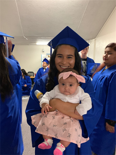 Graduate with their baby