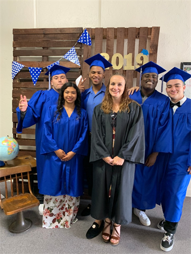 Group of Graduates with teacher