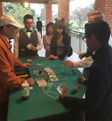 Students playing poker at Prom
