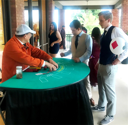 Students playing poker at Prom